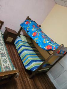 Habitación con cama matrimonial mas cama 1 plaza