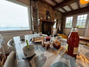 Maisons de vacances Charmante maison bretonne proche de la mer : photos des chambres