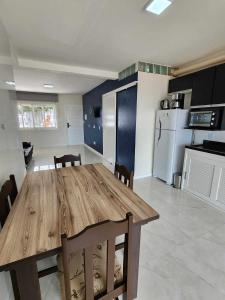 Apartamento-3 pé na areia, churrasqueira, acesso a lagoa, vista para rio, Torres e serra gaúcha