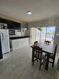 Apartamento-3 pé na areia, churrasqueira, acesso a lagoa, vista para rio, Torres e serra gaúcha - Passo de Torres