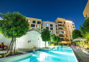 Poolview Studio شقة at Al Zahia - Sunset Escape