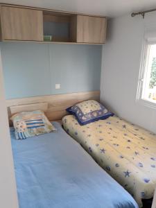 Campings Mobil Home tout confort 6 a 8 personnes Aux Charmettes : photos des chambres