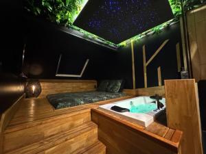 Appartements Need'Amour - Suite chaleureuse : photos des chambres