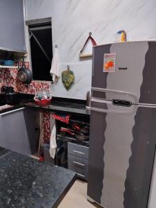 Kitão pé na areia praia e sol