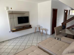 Condomínio Encantador com Piscina ao Lado da Praia