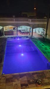 Linda Casa de praia com Super piscina 12x5 Novinha com 3 níveis, Wi-Fi, Tv led,jardim , churrasqueira completa