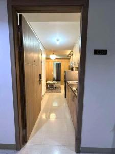 Shore 2 Residences, 1BR Balcony - Pool view