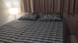 Flat em Caldas Novas no Golden Dolphin Supreme e próx Shopping Singapura com Utensílios e conforto