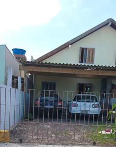 Sobrado Geminado em Capão Novo