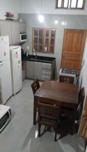 Sobrado Geminado em Capão Novo