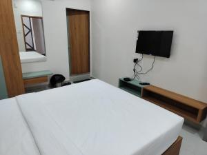 Hotel Amrutam And Guest House
