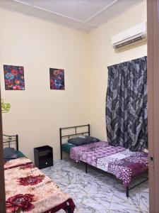 HomeStay TokBah NekWan Splash Mania Bandar Gamuda Cove