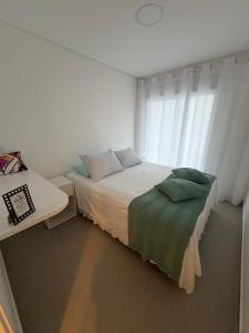 BG - Apartamento alto padrão à beira-mar em Bertioga