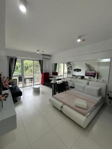 Beach condos at Pico de Loro Cove - Wi-Fi & Netflix, 42-50TVs with Cignal cable, Uratex beds & pillows, equipped kitchen, balcony, parking - guest registration fee is not included