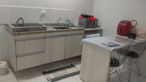 Flat em Caldas Novas no Golden Dolphin Supreme e próx Shopping Singapura com Utensílios e conforto