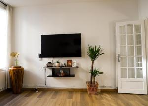 Appartements Le Petit Parisien : photos des chambres