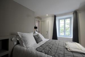 Appartements Le Clos St Louis : photos des chambres