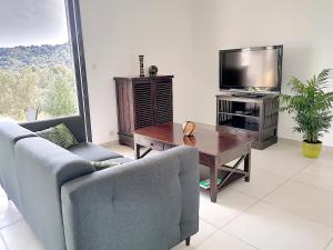 Appartements Bas de villa contemporaine avec vue degagee : photos des chambres