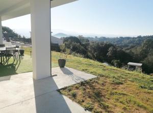 Appartements Bas de villa contemporaine avec vue degagee : photos des chambres