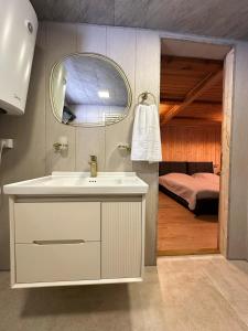 კოტეჯი ბახმაროში WoodenHouse Sunrise