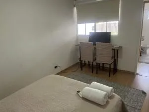 Suite independente condomínio cidade Moncoes - 坎普莫朗