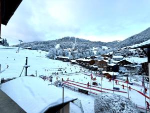 Appartements La clusaz Centre village , pied des pistes, 42 m2 , balcon sud vue montagne : photos des chambres