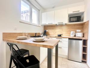 Appartements L-Esplanade - Confort & Lumineux : photos des chambres