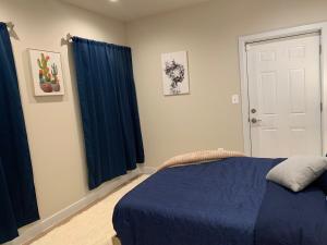Private 2BR Apartment - Free Off Street Parking, Fast Wi-Fi & Laundry