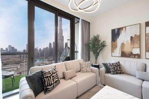 High-Floor Luxe 2BR Stunning Burj Khalifa & Fountain Views Direct Dubai Mall Access