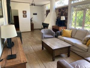 Casa con piscina climatizada y gran jardín