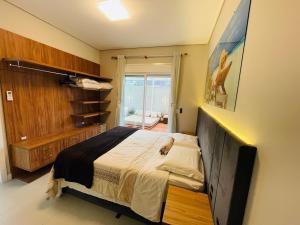 Apartamento Exclusivo a 600m da Praia de Palmas Piscina Banheira de Imersão aquecida rede