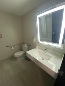 King Room with Bath Tub - Mobility Accessible/Non-Smoking room in Super 8 by Wyndham Oshkosh Airport