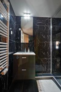Appartements Versailles One Sauna & Jacuzzi : photos des chambres