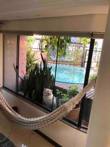 Alugo quarto em cobertura