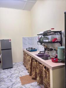 HomeStay TokBah NekWan Splash Mania Bandar Gamuda Cove