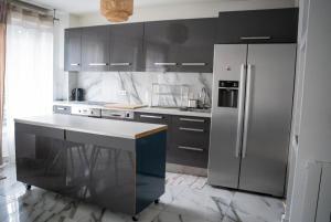 Appartement 4 chambres proche Stade de France, parking et balcon sur jardin