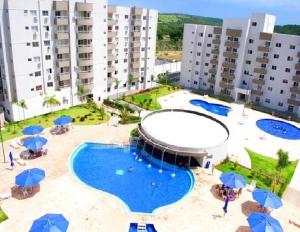 Lagoa Quente Flat Service - Apt mobiliado em condomínio de 9 piscinas quentes e relaxantes