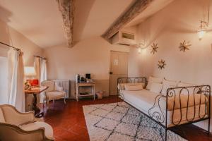 Maisons d'hotes La Maison du Village : photos des chambres