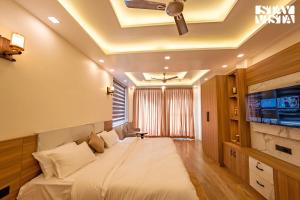 StayVista at Sunset Springs with Heated Swimming Pool