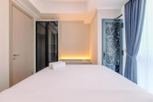 Comfort and Modern Look 1BR Menara Jakarta Kemayoran Apartment By Travelio