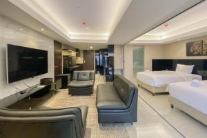 Spacious Combined Studio Apartment at Warhol (WR) Residence By Travelio