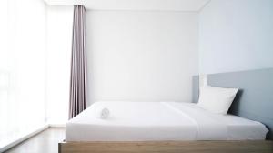 Strategic and Spacious 2BR Apartment at Trillium Residence By Travelio