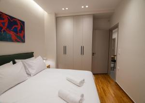 Vibrant Pagrati 2-BD Retreat with Elegant-Modern style