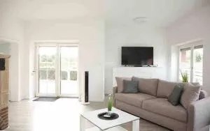 Wunderschöne und moderne Ferienwohnung mit Garten - Hinte