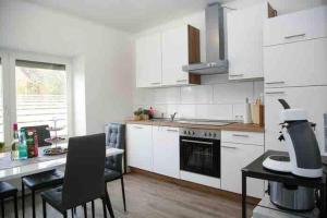 Wunderschöne und moderne Ferienwohnung mit Garten