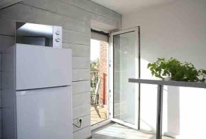 Moderne Wohnung mit Balkon, Küche, Garten Smart-TV