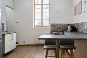 Appartements Charmante maison pour 4 au coeur de Valenciennes : photos des chambres