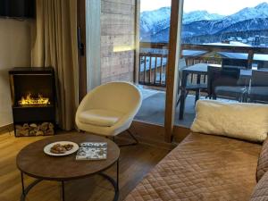 Appartements Appartement 4 pieces avec spa et parking – Les Saisies - FR-1-810-27 : photos des chambres