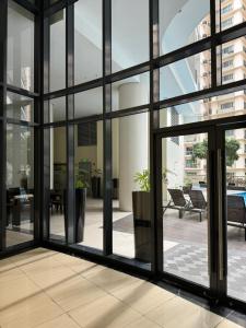 1BR Condo Near Venice Canal Mall & BGC with Balcony - 8p