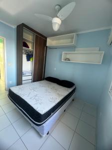 Apto Fantástico foot in the sand